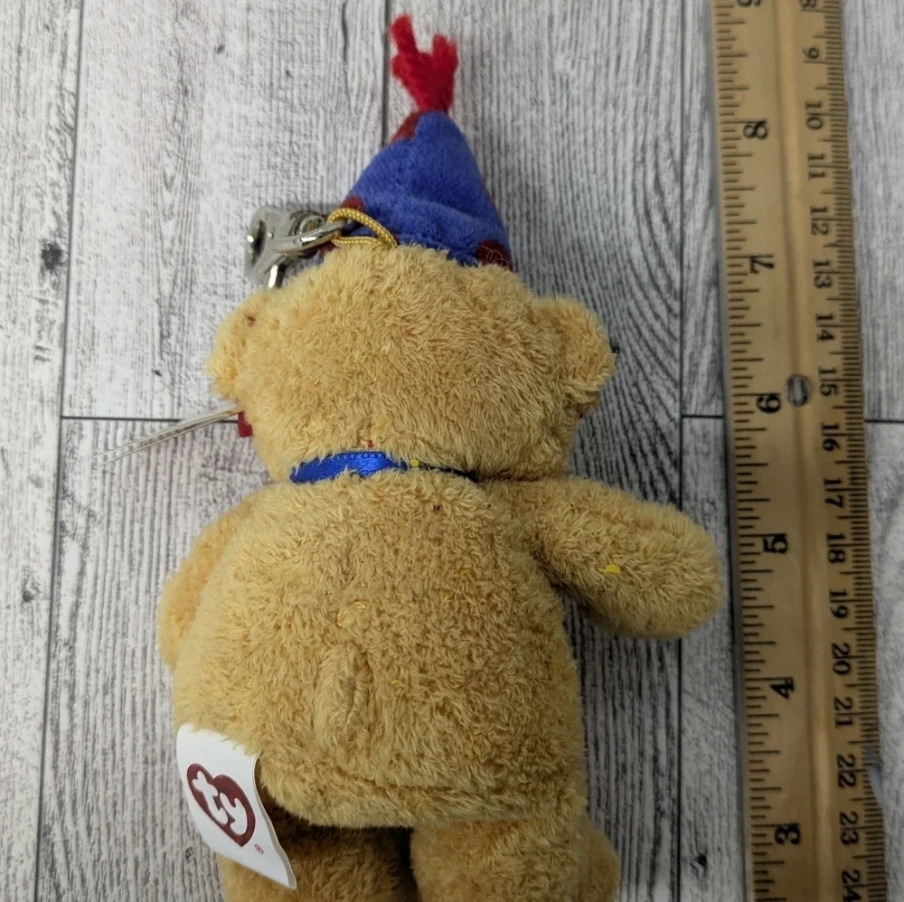 Ty Plush Bear with Blue and Red Party Hat